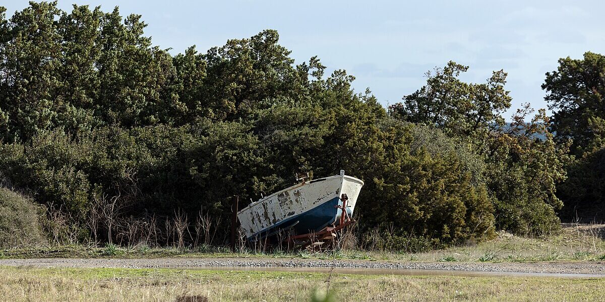 Small fishing boat on trailer at marina